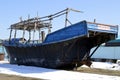 Abandoned North Korean fishing schooner on the shore of the Sea of Ã¢â¬ÂÃÂÃ¢â¬Â¹Ã¢â¬ÂÃÂÃ¢â¬Â¹Japan, Primorye, Russia.